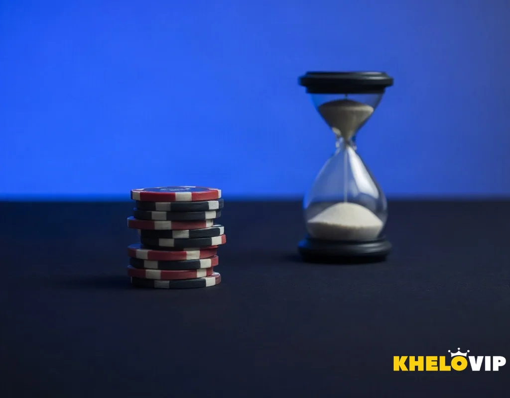 Balanced chip stack and sand timer illustrating bonus terms and responsible gambling